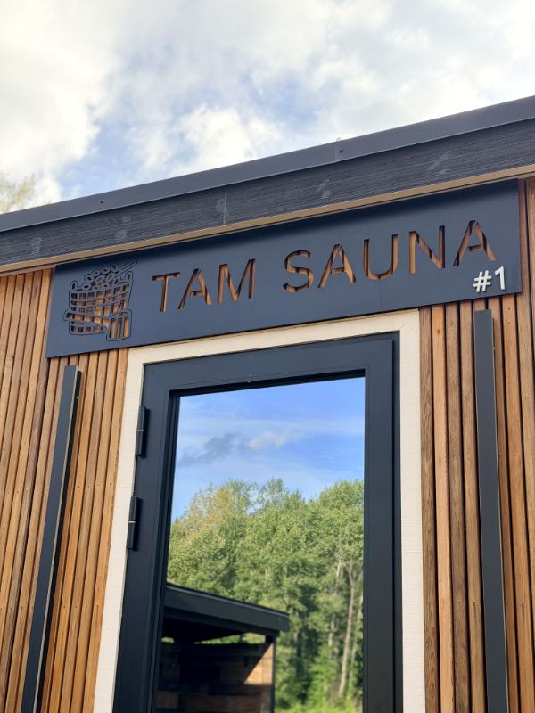 Entrance with the Tam Sauna sign