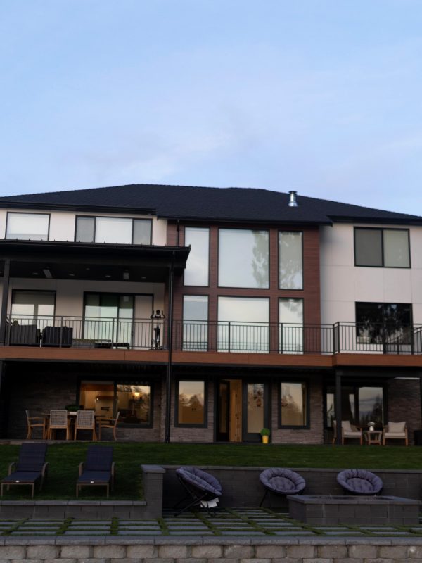 The lake house from the lawn in the evening