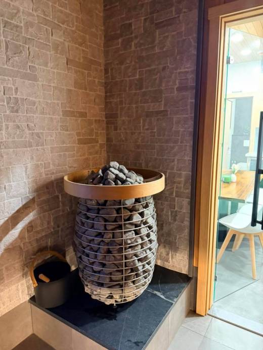 Sauna heater with stones