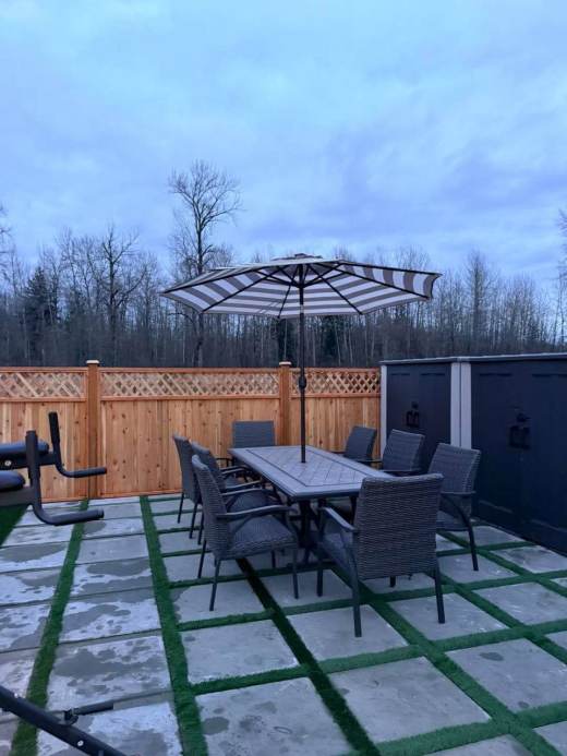 Outdoor dining table with umbrella