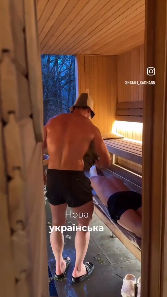 Guest steaming with a venik in the sauna
